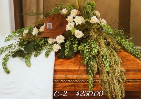 WHITE AND GREEN CASKET SPRAY