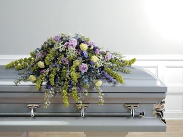Casket Spray In Green And Purple